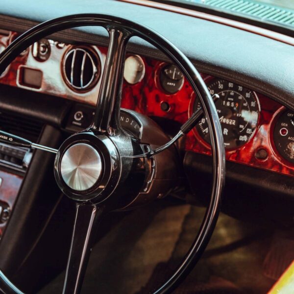 A close up of the dashboard and steering wheel