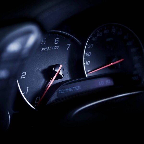 A close up of the speedometer in a car